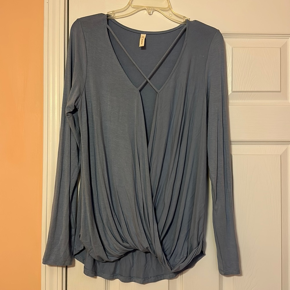Light blue long sleeved top, worn once